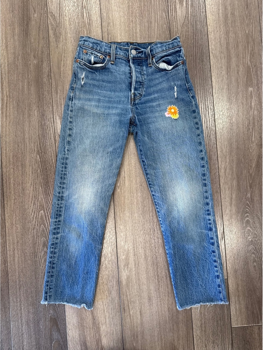 Levi's Women's Distressed Blue Denim Jeans with Daisy Patch
